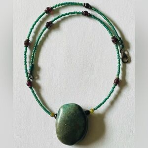 Artesian serpentine pendant necklace with glass and garnet beads
